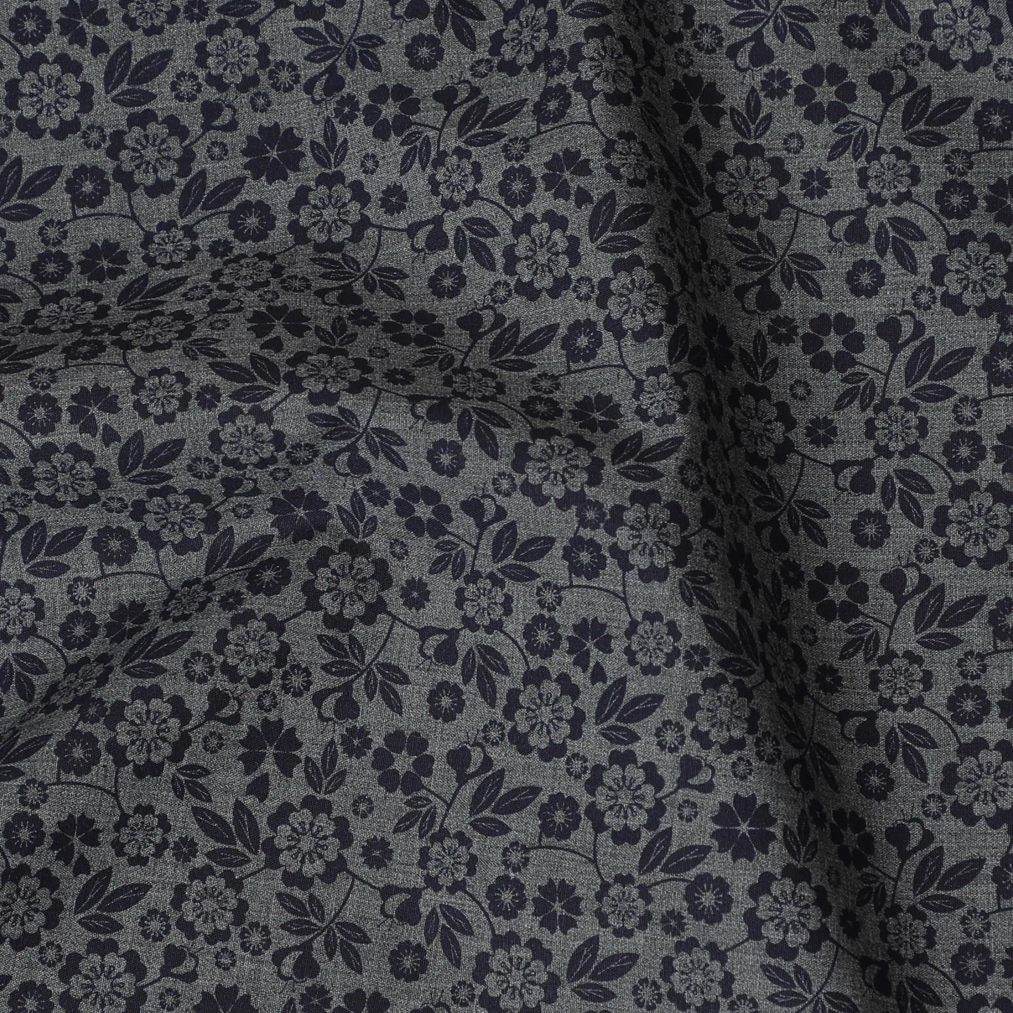Charcoal grey blended cotton shirting fabric with navy blue print in floral design-D16618