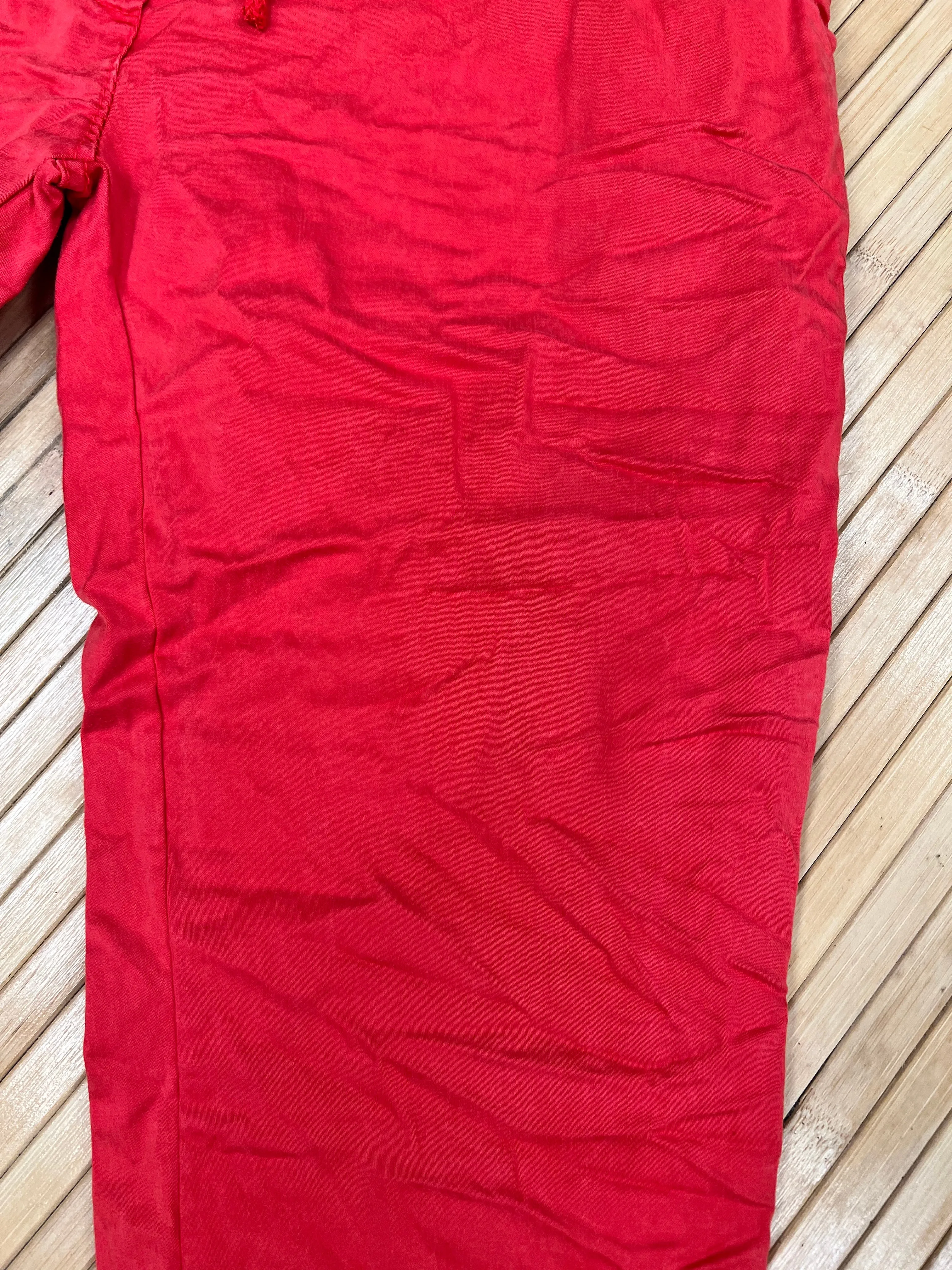 Distressed hem, Italian drawstring joggers.