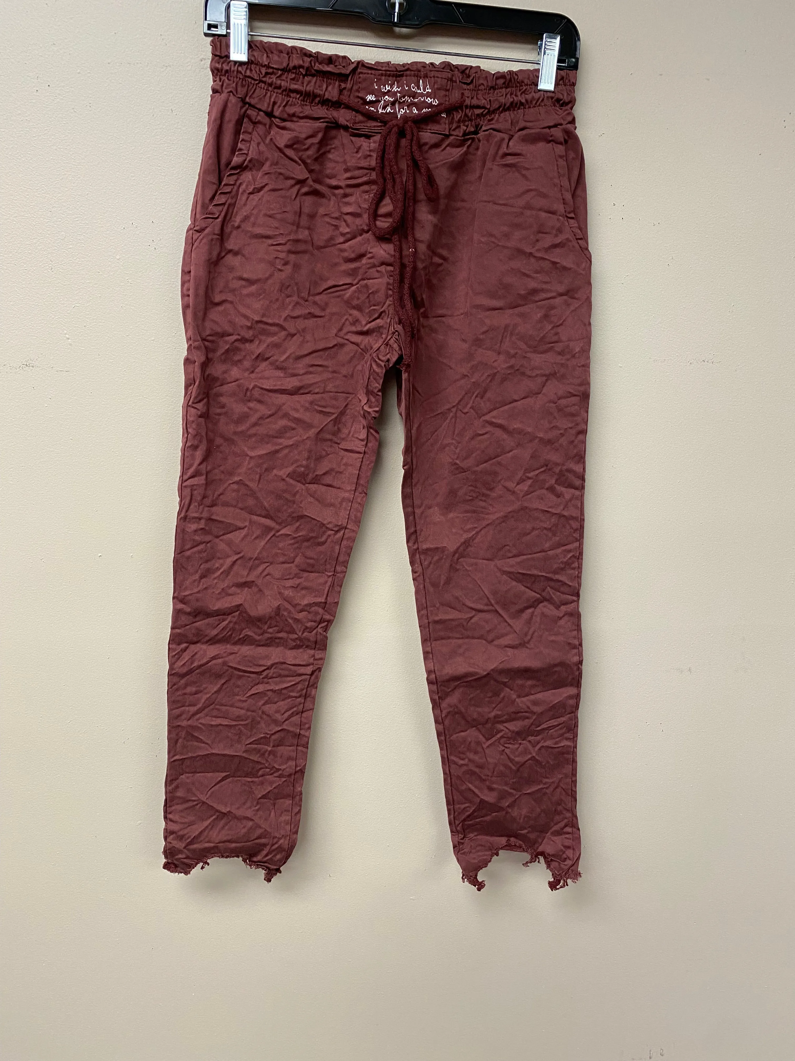 Distressed hem, Italian drawstring joggers.