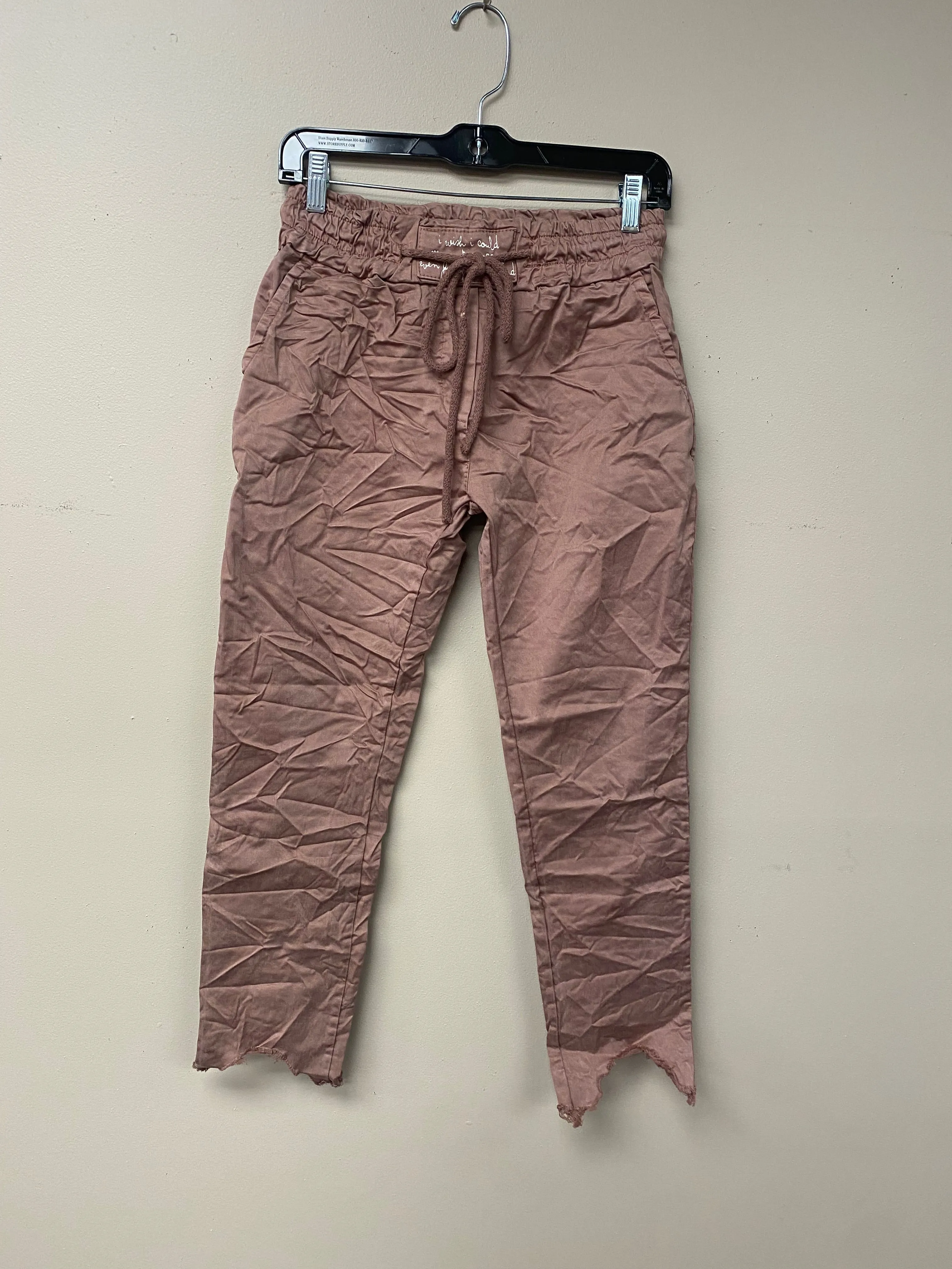 Distressed hem, Italian drawstring joggers.